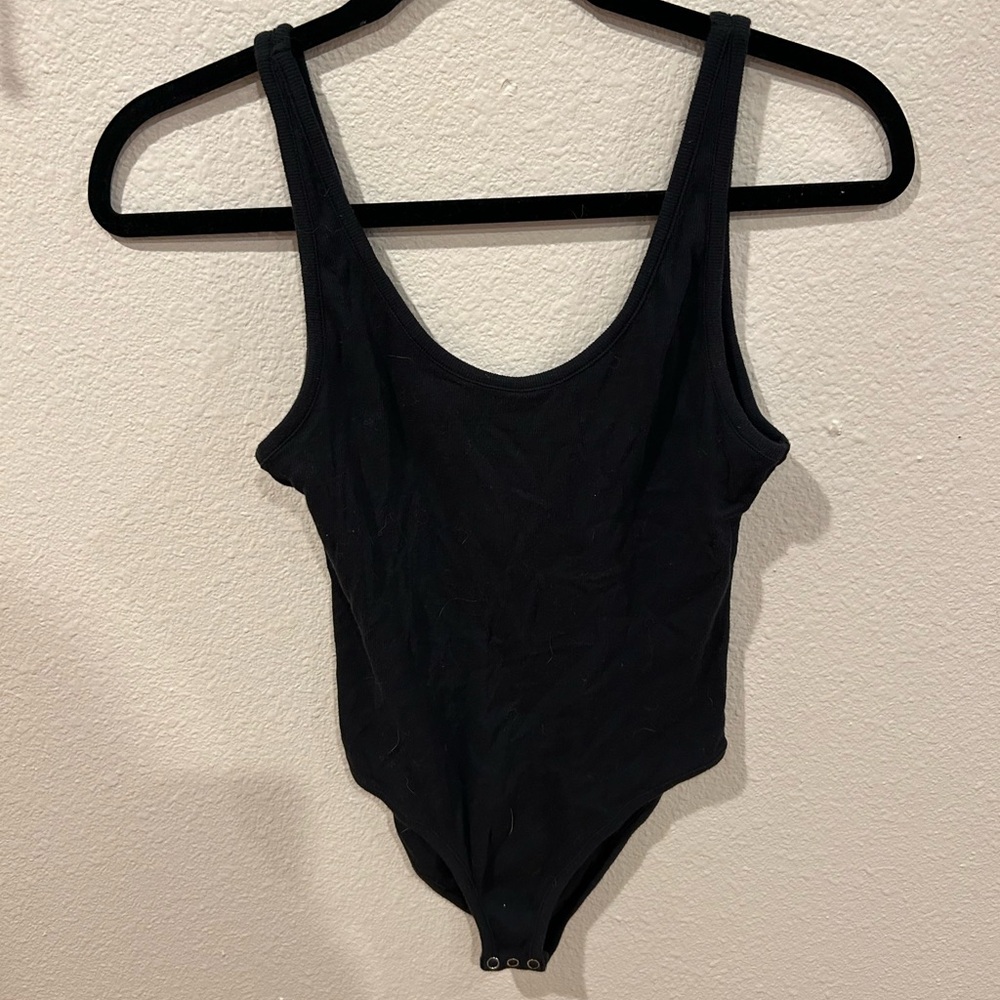 Chic Black Sleeveless Bodysuit